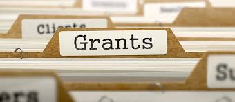 manilla file folder labeled with grant